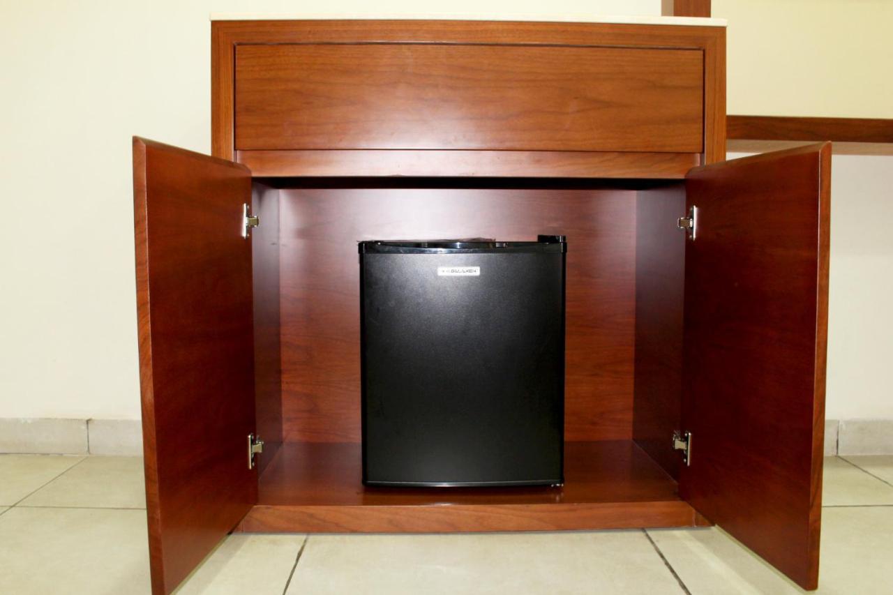 Ixoras Hotel Kinshasa Bagian luar foto