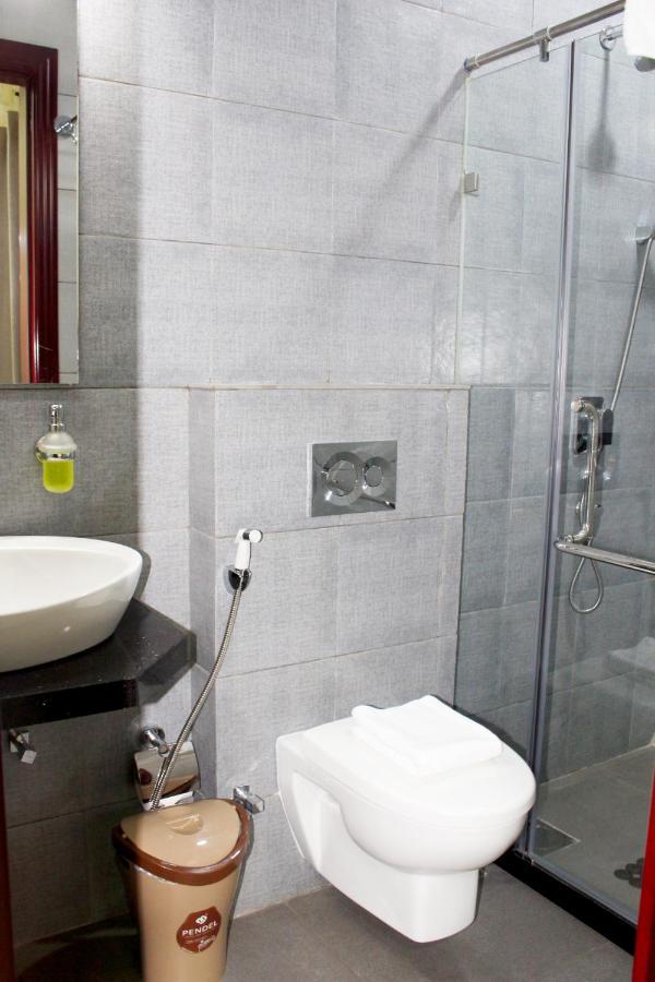 Ixoras Hotel Kinshasa Bagian luar foto