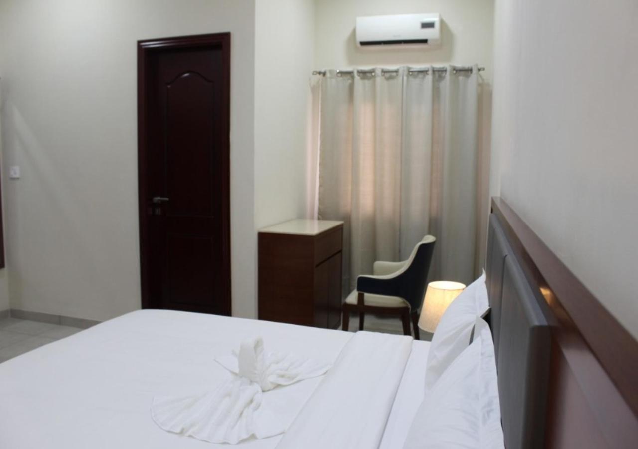 Ixoras Hotel Kinshasa Bagian luar foto