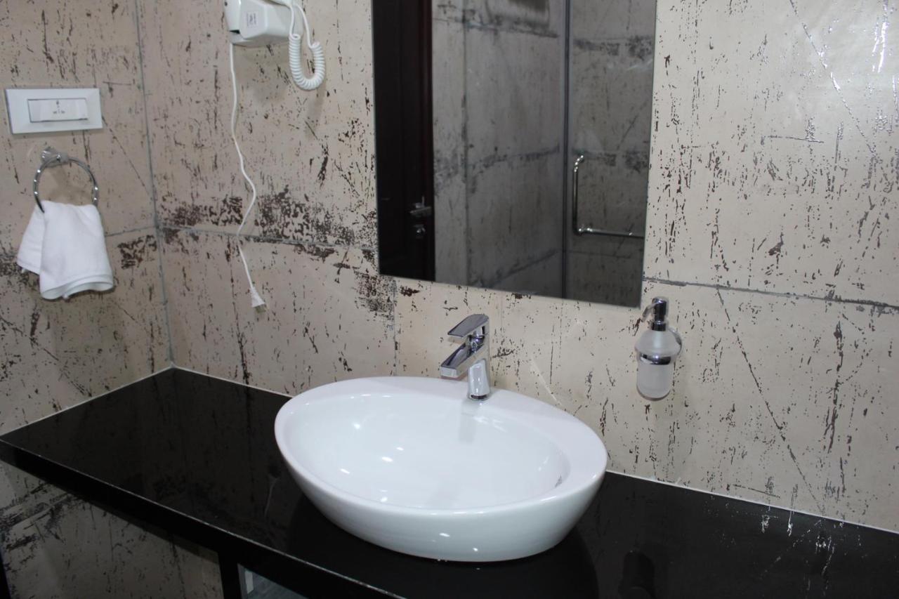 Ixoras Hotel Kinshasa Bagian luar foto